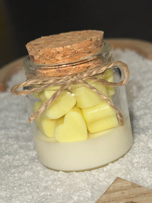 Little glass jar with hearts wax melts